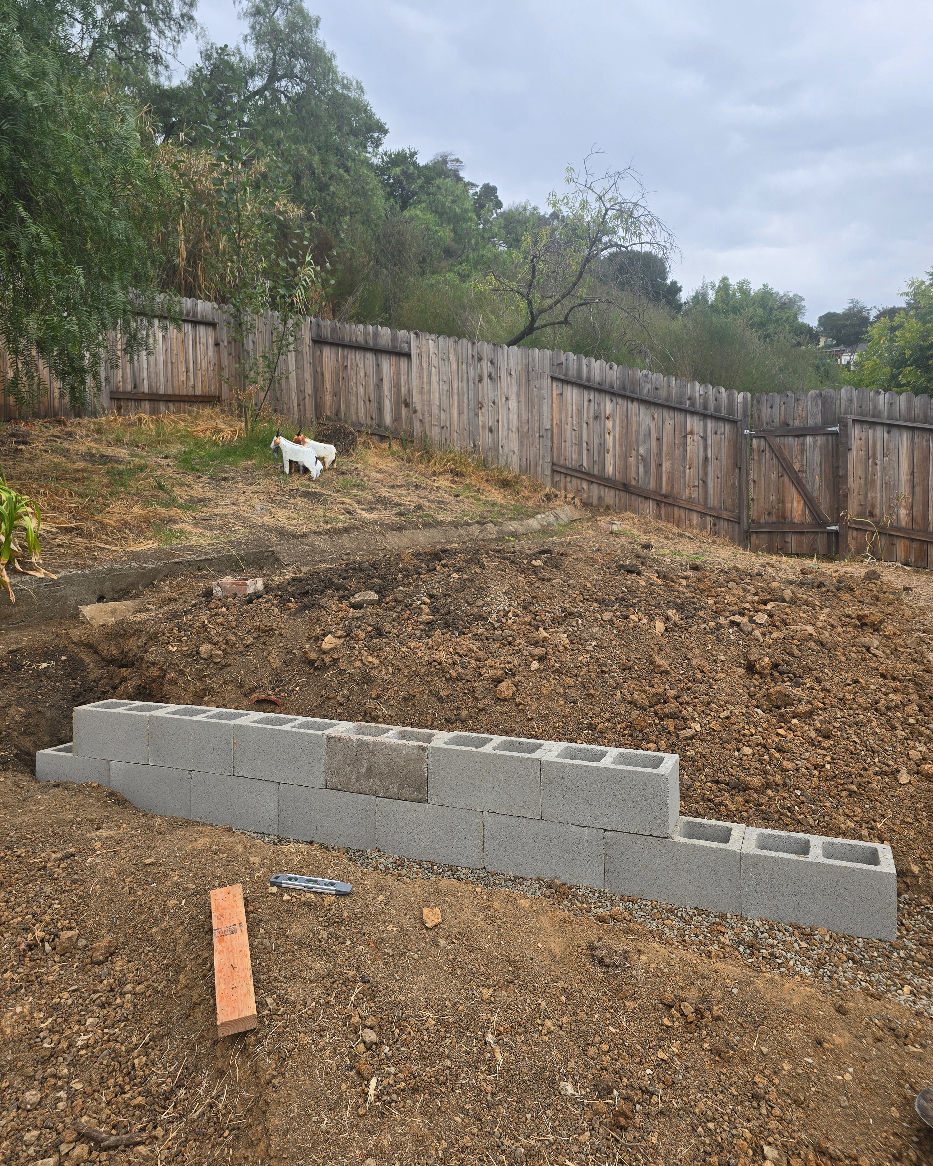 Lower wall construction progress with blocks in place