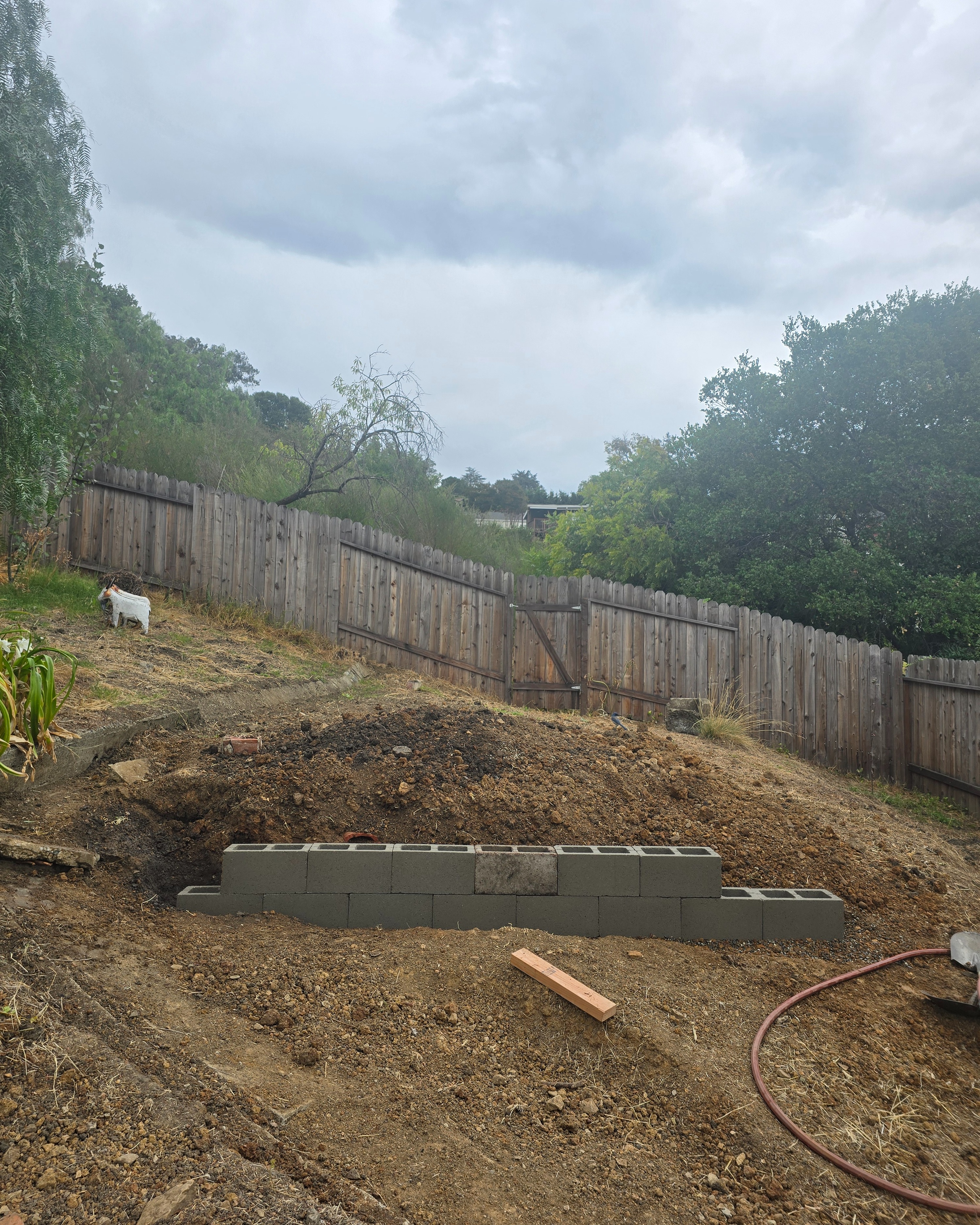 Lower wall block placement showing hillside retention