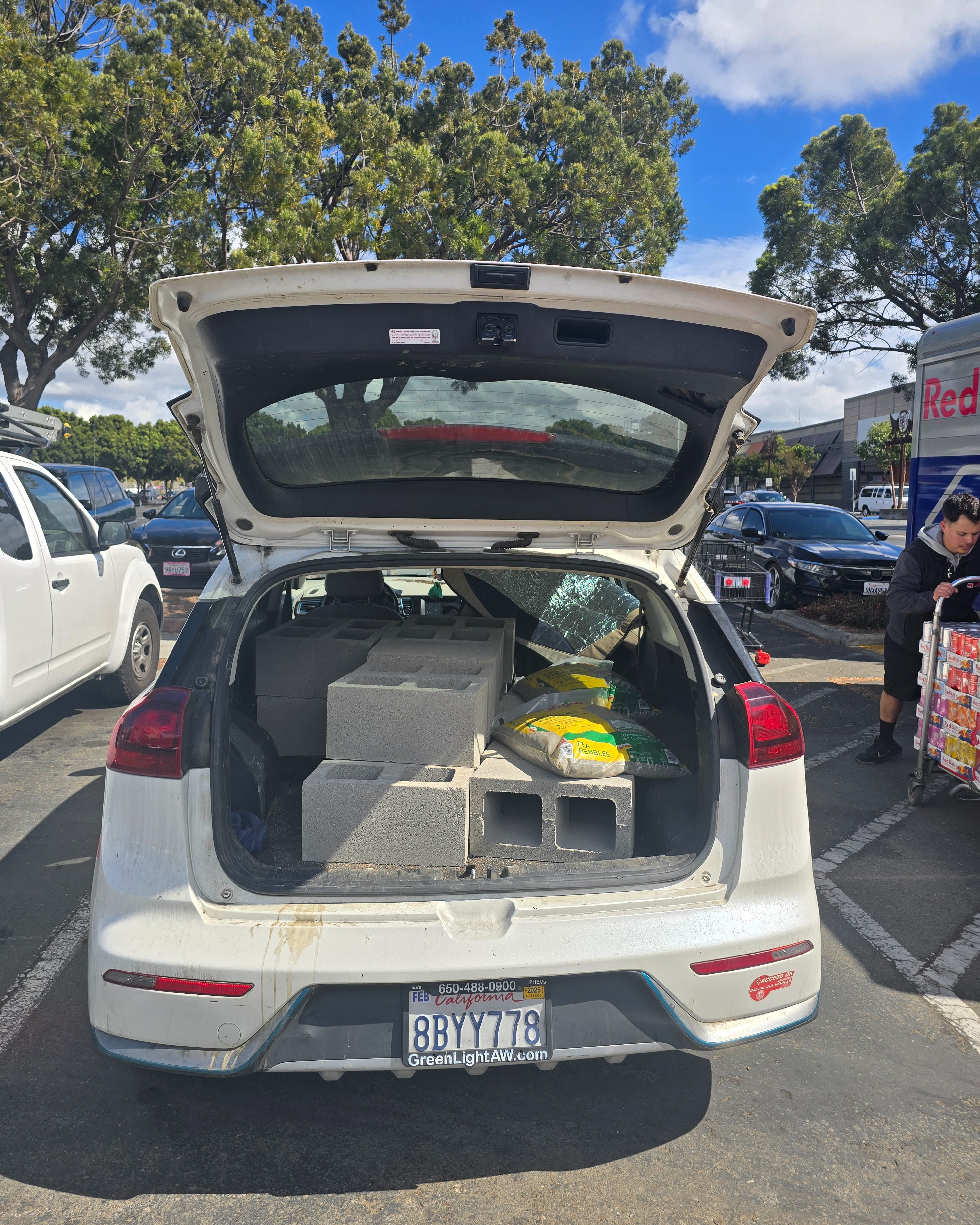 Laying the first courses of blocks for the long wall