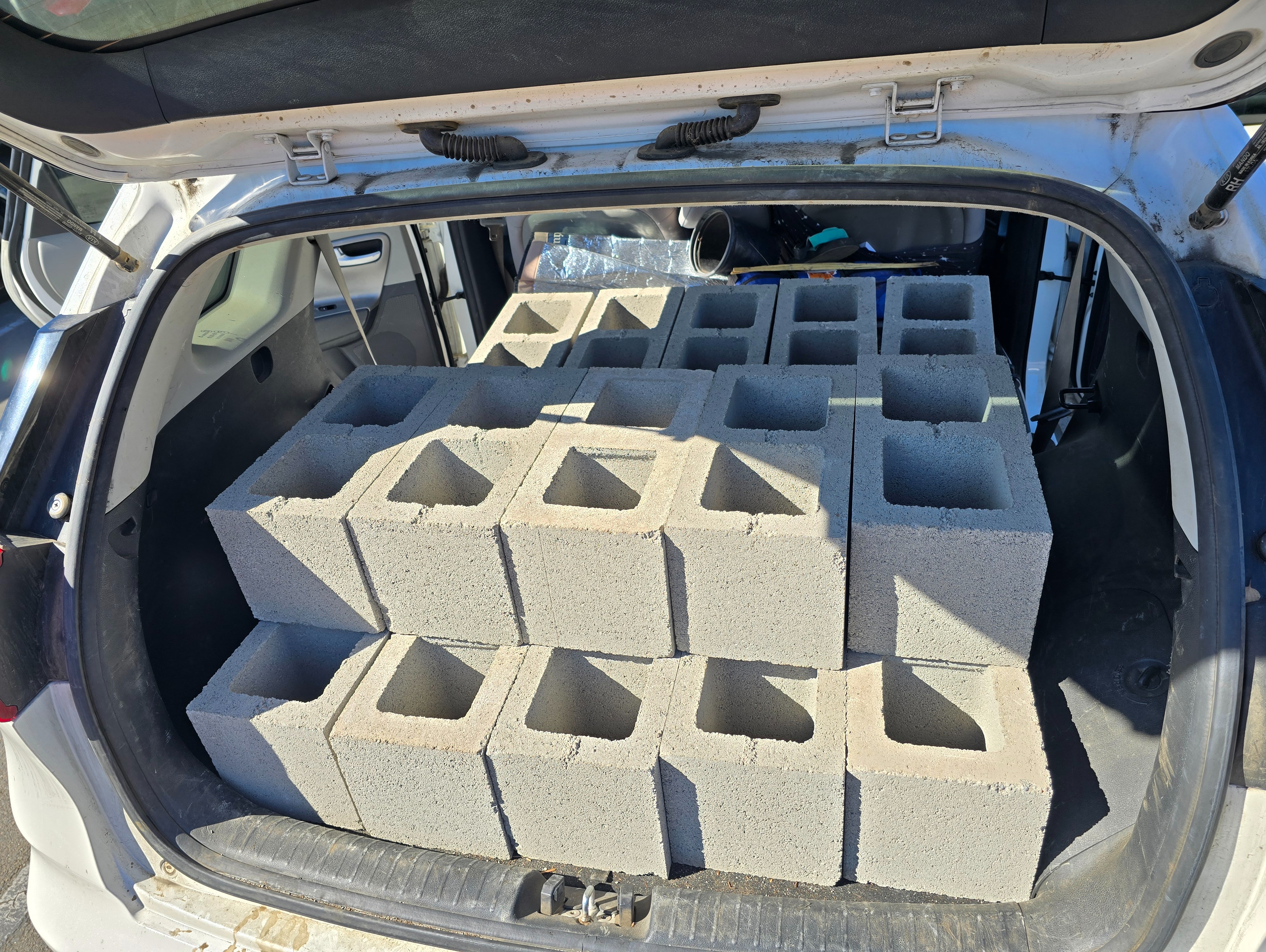 Third course of blocks added to outer long wall