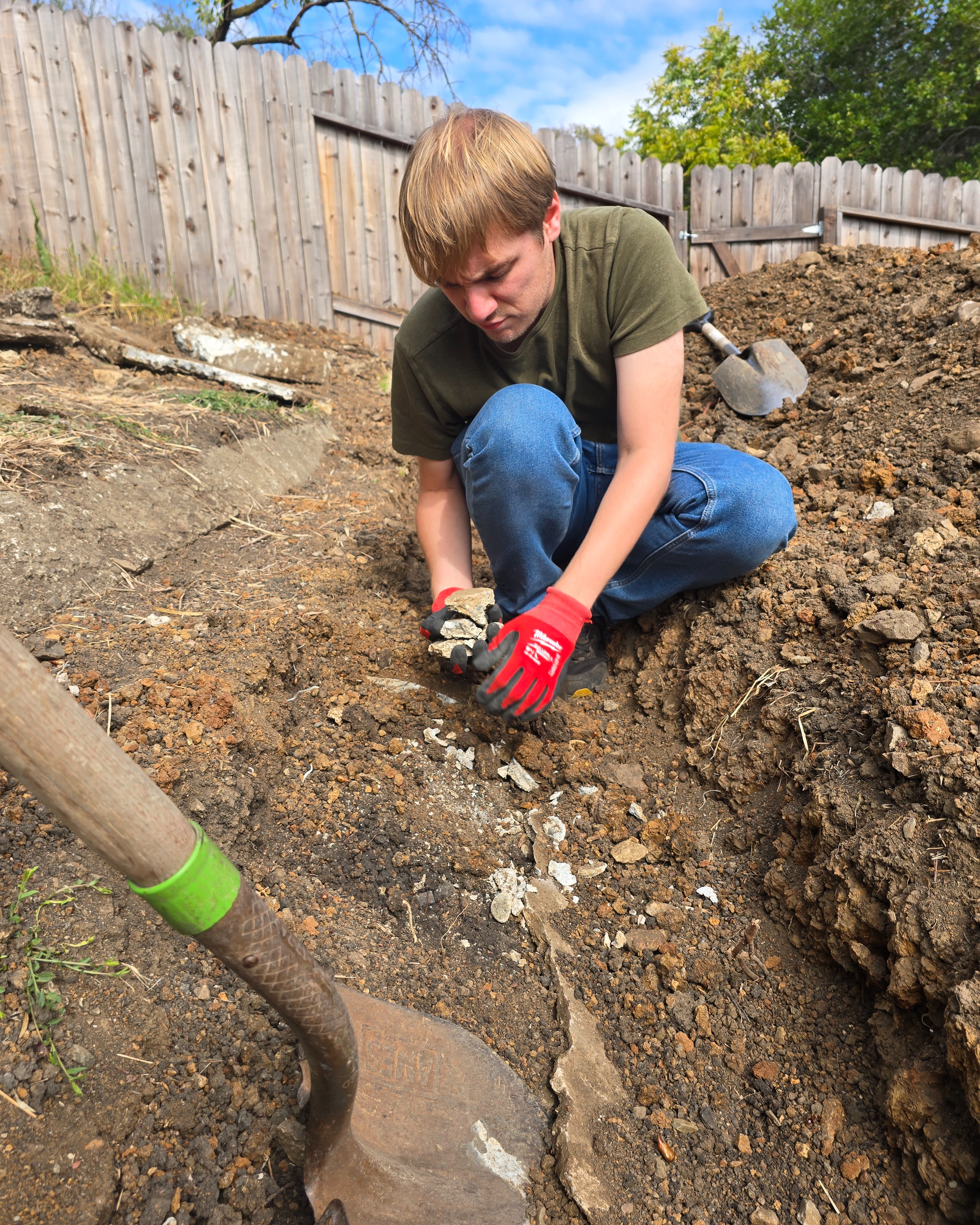 Cutting a passage through the concrete for blocks