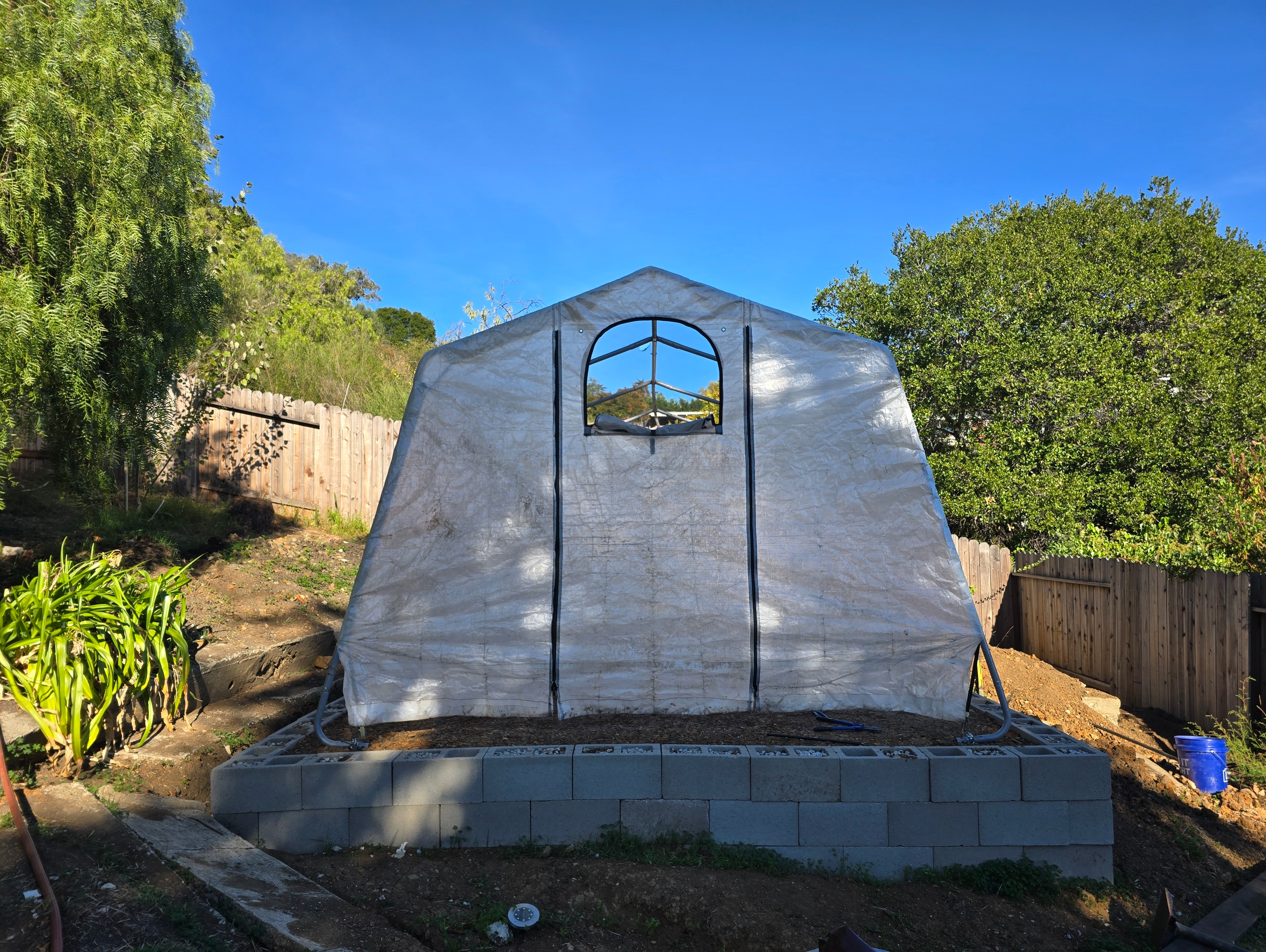 Greenhouse frame with partial covering